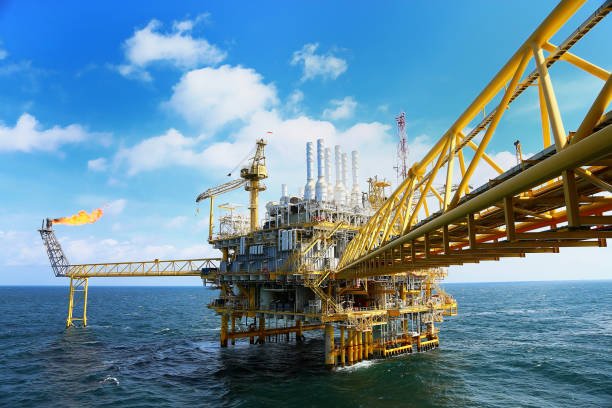 Offshore construction platform for production oil and gas. Oil and gas industry and hard work. Production platform and operation process by manual and auto function from control room.